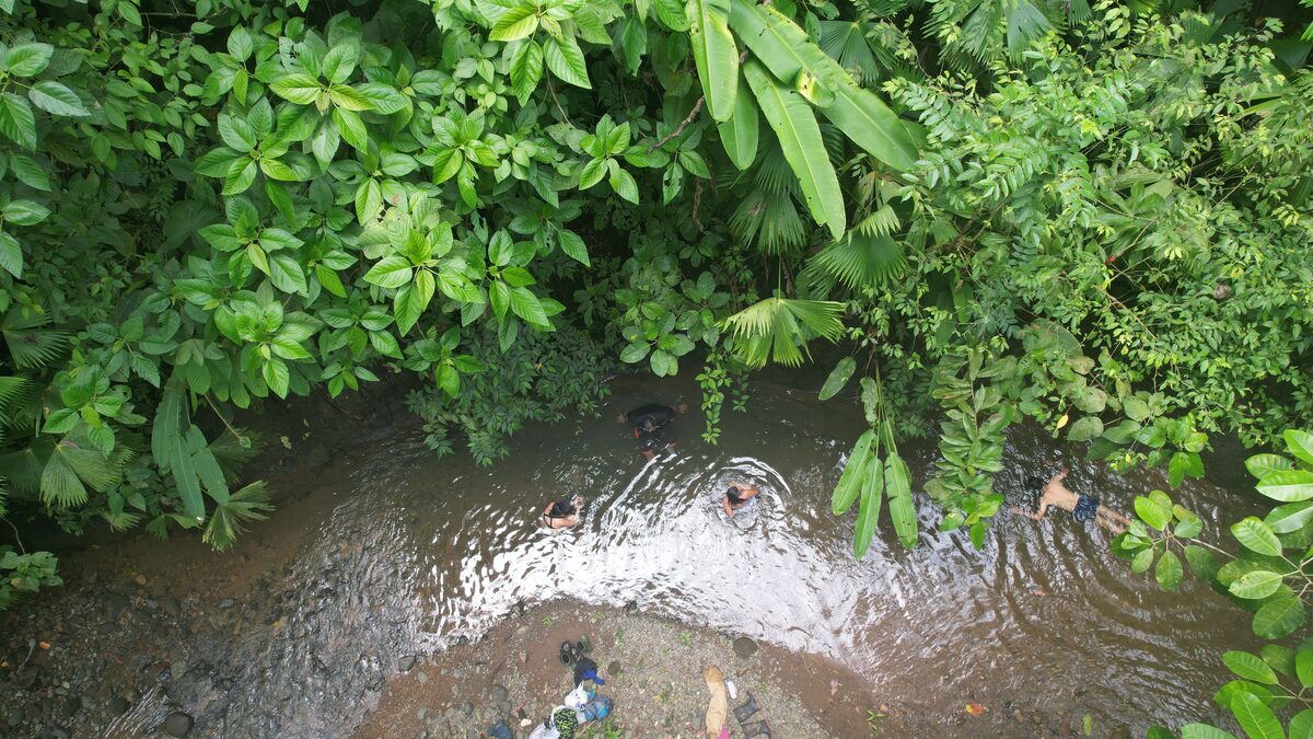 Swimming in a jungle river waterfall pool, Osa Peninsula